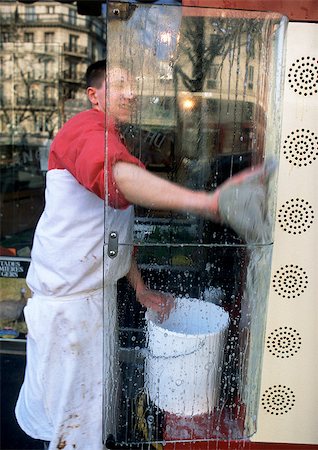 shopfront - Man washing window Stock Photo - Premium Royalty-Free, Code: 696-03396893
