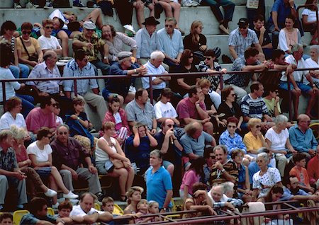 Crowd sitting in stands Stock Photo - Premium Royalty-Free, Code: 696-03397077