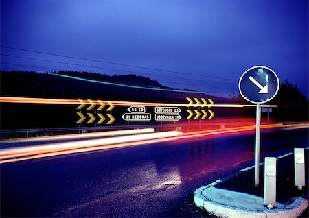 Road with light trails at night Stock Photo - Premium Royalty-Free, Code: 696-03397183