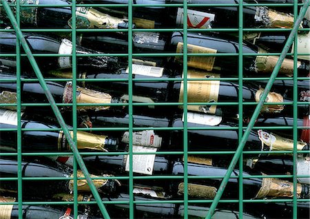 Rack of empty wine bottles, full frame Stock Photo - Premium Royalty-Free, Code: 696-03398455