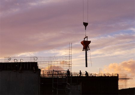 pourer - Construction site, silhouette, sky at sunset in background Stock Photo - Premium Royalty-Free, Code: 696-03398587