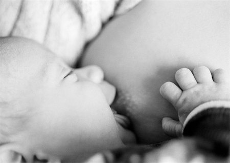 pregnant woman breast - Baby being breastfed, close-up, b&w Stock Photo - Premium Royalty-Free, Code: 696-03398637