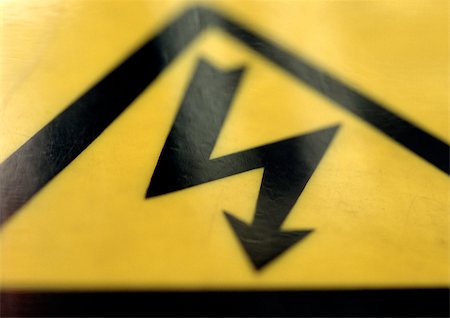 protect pictogram - High-voltage sign, close-up Stock Photo - Premium Royalty-Free, Code: 696-03398766