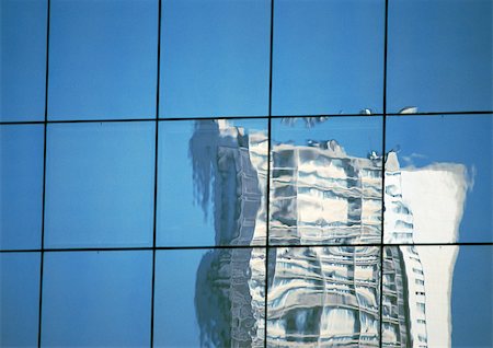 deformity - Building reflected in window panes Stock Photo - Premium Royalty-Free, Code: 696-03399108