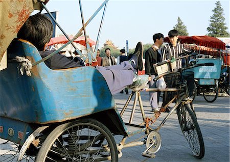 Pilote de Chine, Beijing, détente au pousse-pousse Photographie de stock - Premium Libres de Droits, Code: 696-03399230