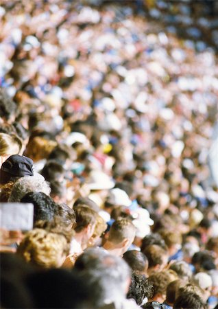 spectators and stadium - Crowd in stadium, high angle view, blurred Stock Photo - Premium Royalty-Free, Code: 696-03399408