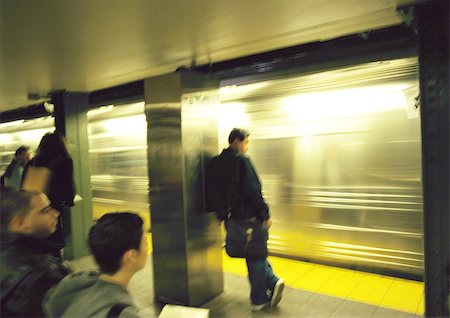 people waiting for subway - People standing on subway platform Stock Photo - Premium Royalty-Free, Code: 696-03399521