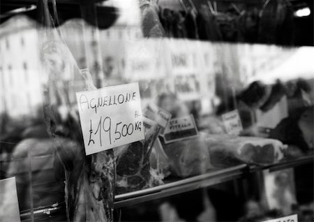 shopfront - Butcher's shop, reflection of crowd, b&w Stock Photo - Premium Royalty-Free, Code: 696-03399962