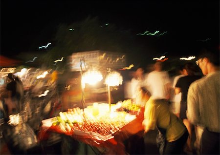 Fruit stall in street at night Stock Photo - Premium Royalty-Free, Code: 696-03399963