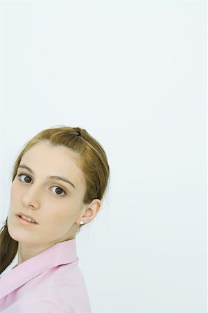 simsearch:632-01193783,k - Young woman, looking at camera, portrait Stock Photo - Premium Royalty-Free, Code: 696-03393927