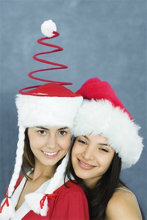 simsearch:693-06435898,k - Young woman and teenage girl wearing holiday costumes, portrait Stock Photo - Premium Royalty-Free, Code: 696-03393951