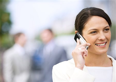 simsearch:695-03376228,k - Businesswoman using cell phone Stock Photo - Premium Royalty-Free, Code: 696-03400203