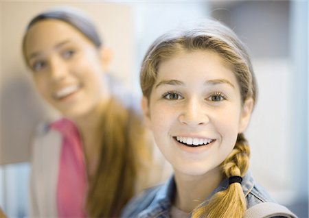 simsearch:400-05697219,k - Teenage girls smiling Stock Photo - Premium Royalty-Free, Code: 696-03400730