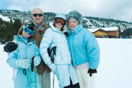 simsearch:696-03401677,k - Grandparents and grandchildren standing in snowy landscape, portrait Stock Photo - Premium Royalty-Free, Code: 696-03401677