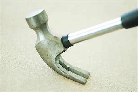 Hammer removing nail, close-up Stock Photo - Premium Royalty-Free, Code: 696-03401874