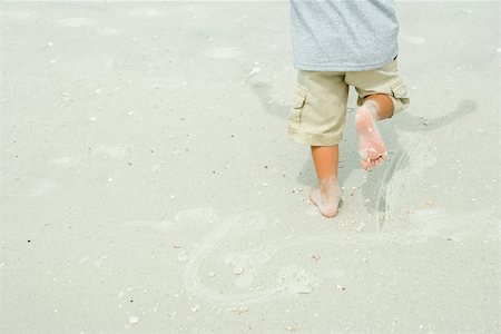 simsearch:633-01715682,k - Child running barefoot on sand, cropped rear view Stock Photo - Premium Royalty-Free, Code: 696-03402122