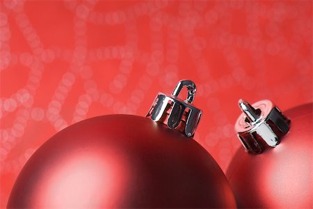 simsearch:633-02418107,k - Two red Christmas tree ornaments, close-up Stock Photo - Premium Royalty-Free, Code: 696-03402816