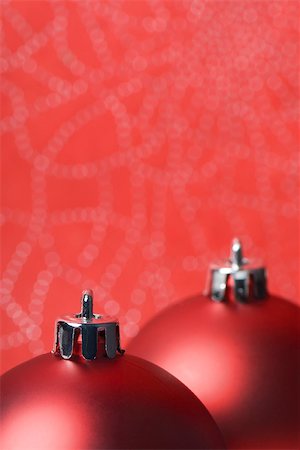 simsearch:633-02418107,k - Two red Christmas tree ornaments, detail Stock Photo - Premium Royalty-Free, Code: 696-03402842