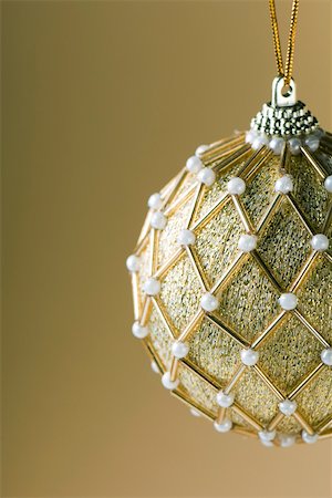 simsearch:633-02418107,k - Ornate gold Christmas tree ornament Stock Photo - Premium Royalty-Free, Code: 696-03402843