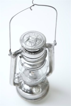 Kerosene lantern, high angle view Stock Photo - Premium Royalty-Free, Code: 696-03402886