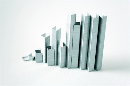 productivity - Strips of staples standing on end mimicking skyscrapers Stock Photo - Premium Royalty-Free, Code: 696-03402918