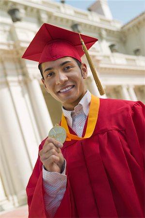 simsearch:693-06014177,k - Graduate Holding Medal, portrait Stock Photo - Premium Royalty-Free, Code: 693-06014149