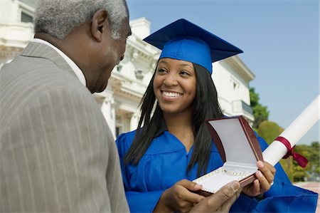 simsearch:693-06014177,k - Graduate receiving present from father outside university Stock Photo - Premium Royalty-Free, Code: 693-06014200