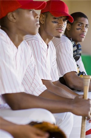 simsearch:614-00657328,k - Baseball players sitting in dugout Stock Photo - Premium Royalty-Free, Code: 693-06014895