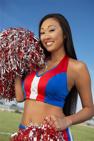 simsearch:693-03299836,k - Cheerleader with pom poms Stock Photo - Premium Royalty-Free, Code: 693-06015064