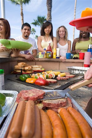 Friends at Barbecue Stock Photo - Premium Royalty-Free, Code: 693-06015278