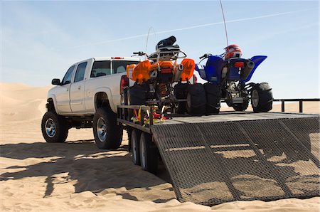 ATVs on Trailer Behind Pickup Truck Stock Photo - Premium Royalty-Free, Code: 693-06015644