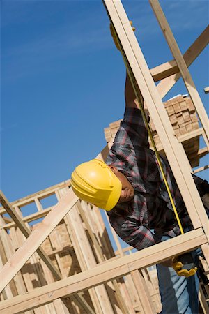 simsearch:693-06016727,k - Construction worker measuring building Stock Photo - Premium Royalty-Free, Code: 693-06016704