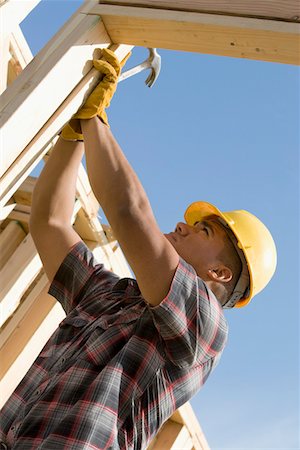 simsearch:693-06016727,k - Construction worker checking building Stock Photo - Premium Royalty-Free, Code: 693-06016708
