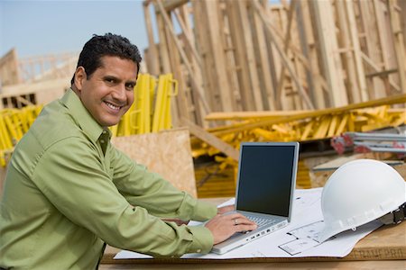 simsearch:693-06016727,k - Construction worker using laptop, portrait Stock Photo - Premium Royalty-Free, Code: 693-06016715