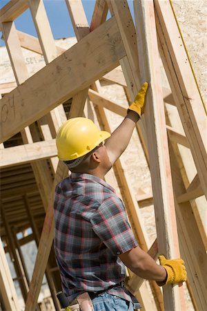 simsearch:693-06016727,k - Construction worker at work on building Stock Photo - Premium Royalty-Free, Code: 693-06016710