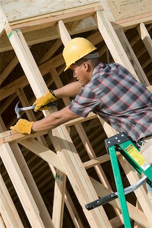 simsearch:693-06016727,k - Construction worker at work on building Stock Photo - Premium Royalty-Free, Code: 693-06016711