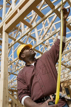 simsearch:693-06016727,k - Construction worker measuring building Stock Photo - Premium Royalty-Free, Code: 693-06016727