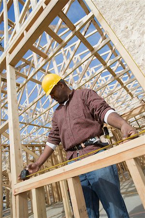 simsearch:693-06016727,k - Construction worker measuring building Stock Photo - Premium Royalty-Free, Code: 693-06016728