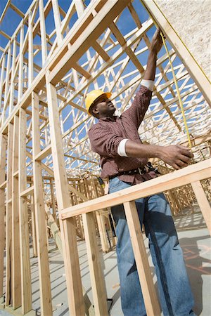 simsearch:693-06016727,k - Construction worker measuring building Stock Photo - Premium Royalty-Free, Code: 693-06016729