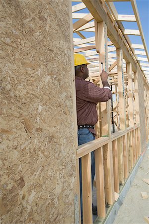 simsearch:693-06016727,k - Construction worker measuring building Stock Photo - Premium Royalty-Free, Code: 693-06016730