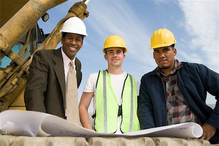 simsearch:693-06016727,k - Surveyor and construction workers on site, portrait Stock Photo - Premium Royalty-Free, Code: 693-06016808