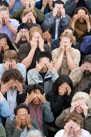 person protest - Crowd covering eyes Stock Photo - Premium Royalty-Free, Code: 693-06017577