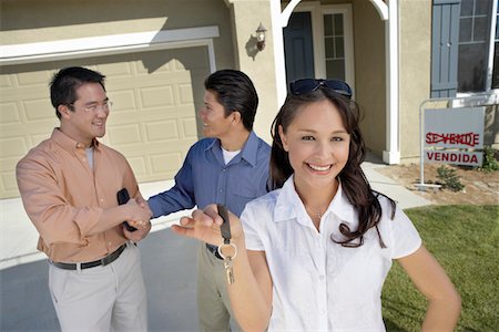 simsearch:693-03308239,k - Couple with keys to new home Stock Photo - Premium Royalty-Free, Code: 693-06017927