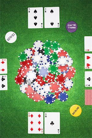 poker game - Playing cards and chips, view from above Stock Photo - Premium Royalty-Free, Code: 693-06018666