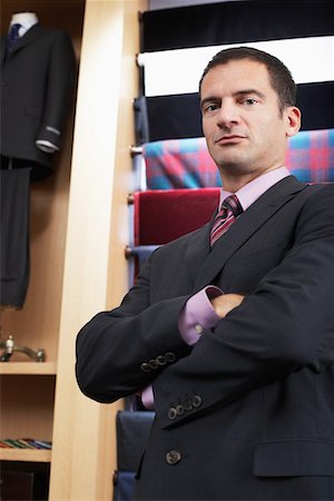 portrait man shirt shop - Businessman in clothes store, portrait Stock Photo - Premium Royalty-Free, Code: 693-06018816