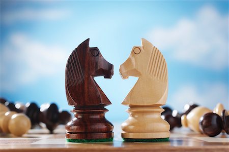 stalemate - Chess pieces, two knights face to face Stock Photo - Premium Royalty-Free, Code: 693-06018917