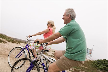 Middle-aged couple riding bicycles Stock Photo - Premium Royalty-Free, Code: 693-06013757