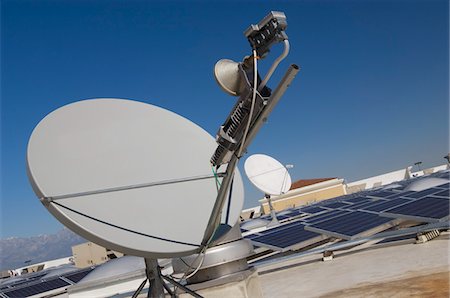 satellite dish - Satellite Dish with Solar Panels at Solar Power Plant Stock Photo - Premium Royalty-Free, Code: 693-06020515