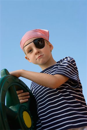 eye patch - Little Boy Playing Pirate Stock Photo - Premium Royalty-Free, Code: 693-06020564