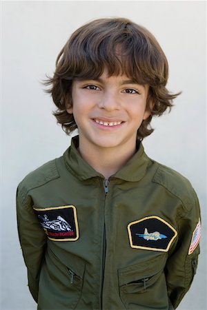 Boy Wearing Pilots Jacket Stock Photo - Premium Royalty-Free, Code: 693-06020705